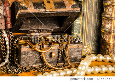 Treasure chests with gold. Pearls and gold chains. 61532632