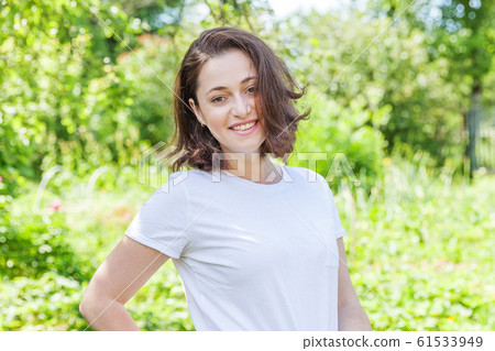 Happy girl smiling. Beauty portrait young happy 61533949