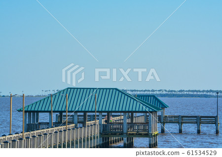Fishing pier on the Mississippi Gulf Coast. Biloxi, Gulf of Mexico, Harrison County, Mississippi USA 61534529