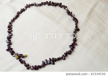 The circle is made of female beautiful beads,  61534530