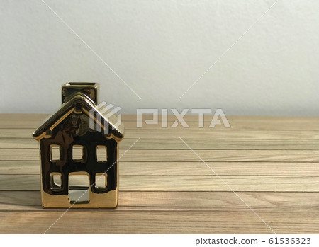 Miniature Gold House in Wood Planks photo 61536323