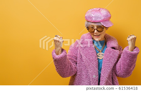 senior woman on color background. senior woman on color background. 61536418