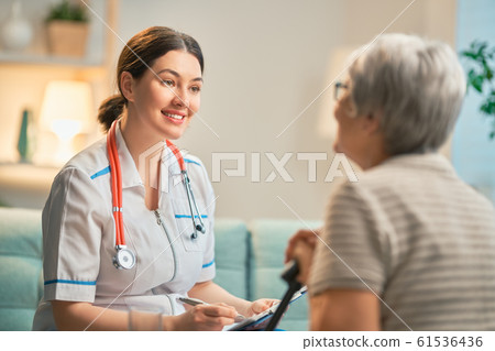 Happy patient and caregiver Happy patient and caregiver 61536436