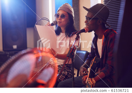 Young African Man Singing with Band Young African Man Singing with Band 61536721