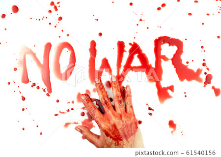 No war word is written with finger bloody on a white background, blood drop No war word is written with finger bloody on a white background, blood drop 61540156