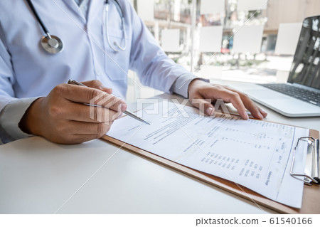 The male doctor sat and checked the patient's history and used a laptop to record patient information at the hospital. Medical concepts and interests The male doctor sat and checked the patient's history and used a laptop to record patient information at the hospital. Medical concepts and interests 61540166