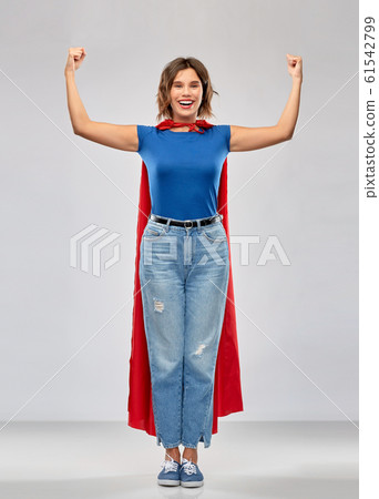 happy woman in red superhero cape showing power happy woman in red superhero cape showing power 61542799