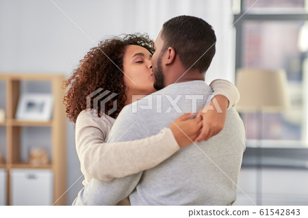 happy african american couple kissing at home - Stock Photo [61542843] -  PIXTA