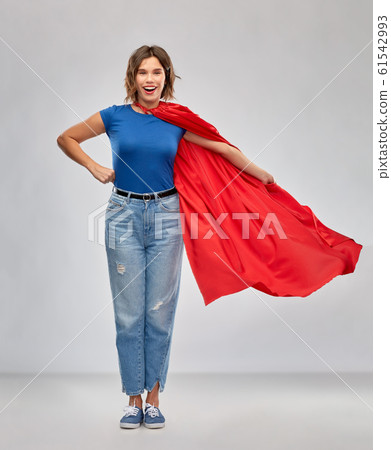 happy woman in red superhero cape happy woman in red superhero cape 61542993