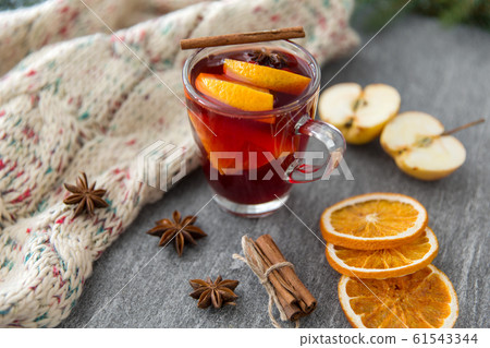glass of hot mulled wine with orange and cinnamon glass of hot mulled wine with orange and cinnamon 61543344