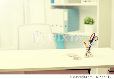 stationery on table in office interior stationery on table in office interior 61543419