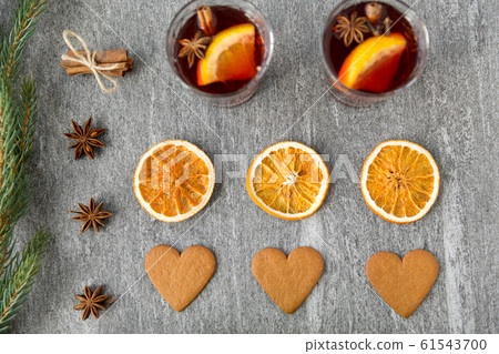 mulled wine, orange slices, gingerbread and spices mulled wine, orange slices, gingerbread and spices 61543700