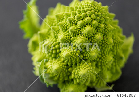 close up of romanesco broccoli on table 61543898