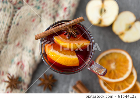glass of hot mulled wine with orange and cinnamon glass of hot mulled wine with orange and cinnamon 61544122