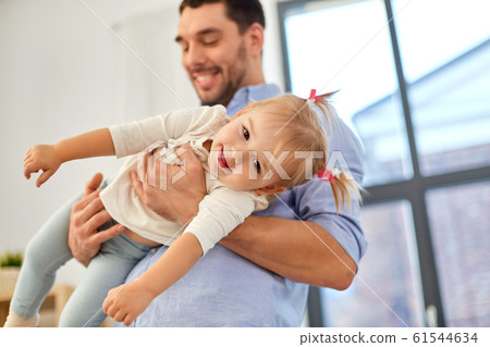 father with little baby daughter at home 61544634
