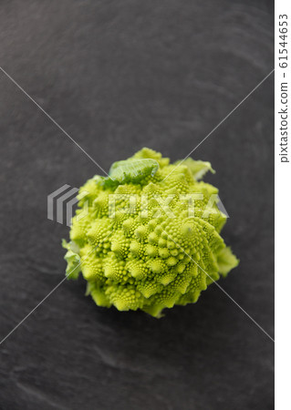 close up of romanesco broccoli on slate stone close up of romanesco broccoli on slate stone 61544653