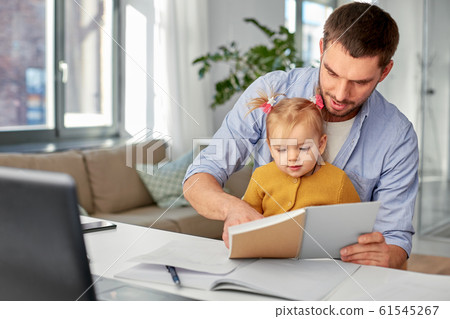 working father with baby daughter at home office working father with baby daughter at home office 61545267