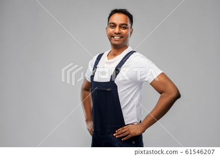 happy smiling indian worker or builder 61546207