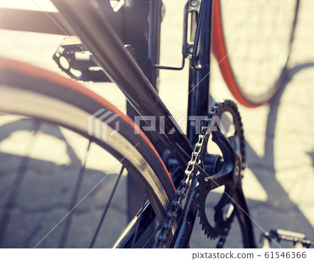 close up of fixed gear bicycle on city street close up of fixed gear bicycle on city street 61546366