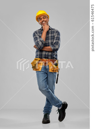happy indian builder in helmet with tool belt happy indian builder in helmet with tool belt 61546475