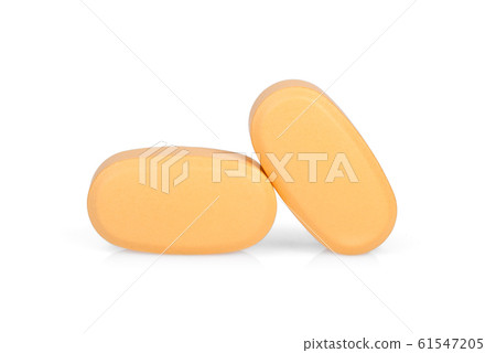 brown pills isolated on white background 61547205