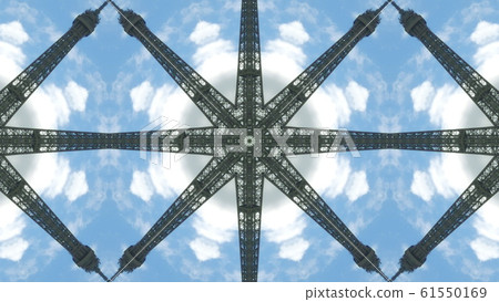 View to the Eiffel Tower on sky background, artistic kaleidoscopic effect 61550169