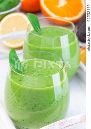 Green detox smoothie with avocado, spinach 61552385
