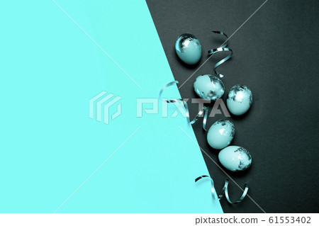 Creative easter card with blue golden eggs on blue Creative easter card with blue golden eggs on blue 61553402