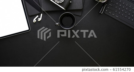 Top view of dark stylish workplace with office 61554270