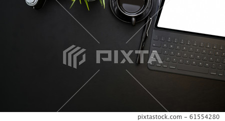 Overhead shot of modern workplace with blank Overhead shot of modern workplace with blank 61554280