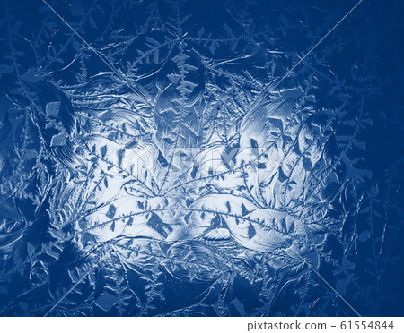 ice background texture frost pattern. Classic blue toning trend 2020 year color 61554844
