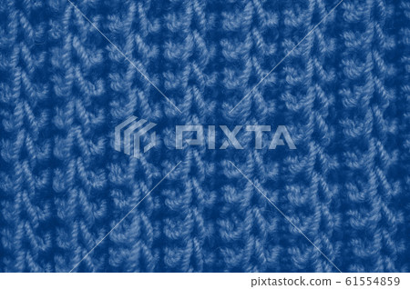 fabric knitted texture background with scarf clothing. Classic blue toning trend 2020 color fabric knitted texture background with scarf clothing. Classic blue toning trend 2020 color 61554859