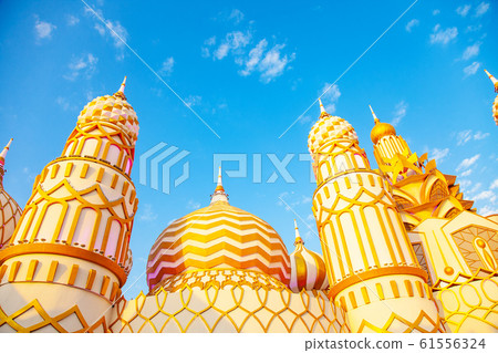 Sunset view of arabic mosque and blue sky 61556324