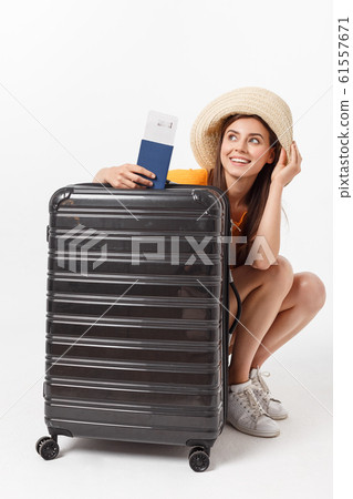 Full length of attractive young female in traveller casual with the travel bag, isolated on white background 61557671