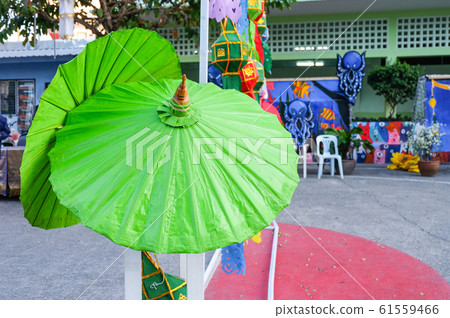 Green Color paper umbrella show on stand entrance 61559466