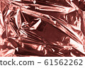 Abstract crumpled foil background. Grunge photo 61562262