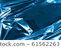Abstract crumpled foil background. Grunge photo 61562263