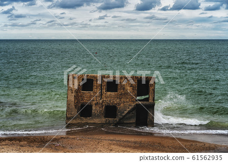 Fragments of an old fort at sea 61562935