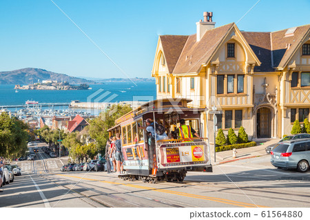Cable Car in San Francisco climbing up hill, California, USA 61564880