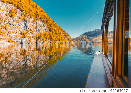Traditional boat on Koenigssee lake in fall, Bavaria, Germany Traditional boat on Koenigssee lake in fall, Bavaria, Germany 61565027