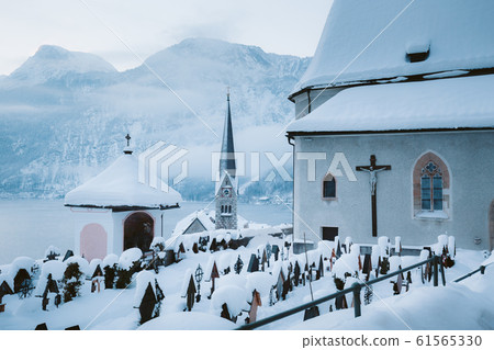 Hallstatt graveyard with tombstones in winter, Austria Hallstatt graveyard with tombstones in winter, Austria 61565330