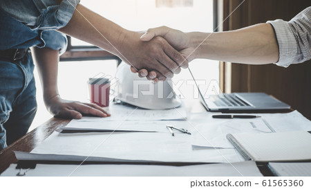 Meeting and greeting, Two engineer or architect Meeting and greeting, Two engineer or architect 61565360