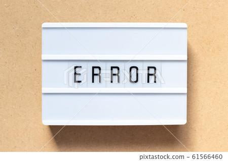 White lightbox with word error on wood background 61566460