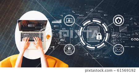 Data protection concept with person using a laptop Data protection concept with person using a laptop 61569192