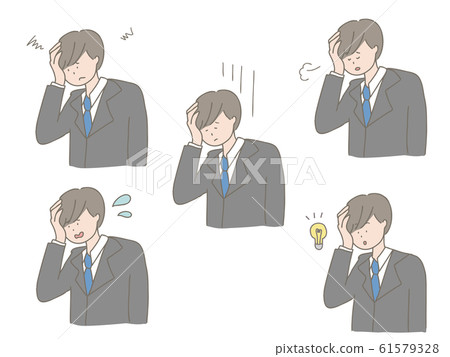 A man in a suit holding his head A man in a suit holding his head 61579328