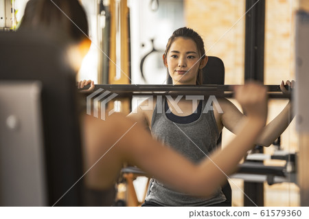 Personal gym image_ Female barbell 61579360