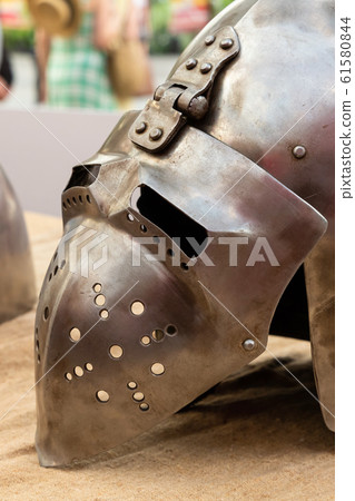 old iron helmet of a medieval warrior part of old iron helmet of a medieval warrior part of 61580844