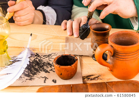 an inkwell with a white quill pen traditional an inkwell with a white quill pen traditional 61580845