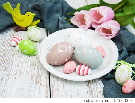 Easter eggs and tulips 61583069