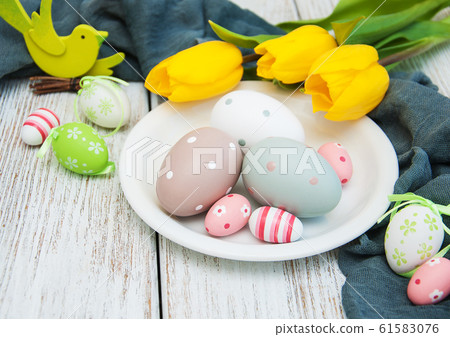 Easter eggs and tulips 61583076